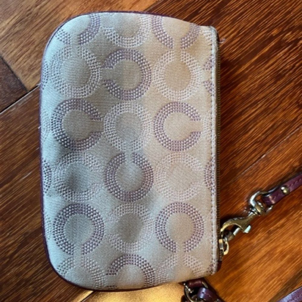 Purple and Tan Coach Cluch